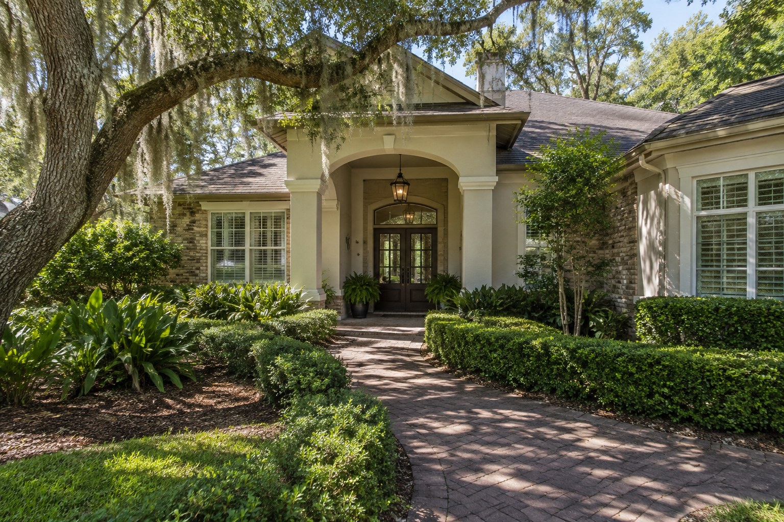 A shaded front entry of a Florida home, illustrative